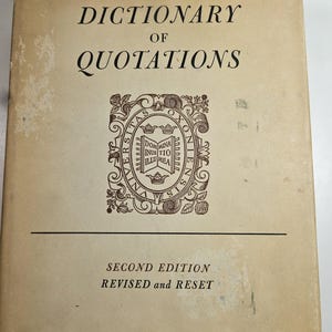 May include: The Oxford Dictionary of Quotations, second edition, revised and reset. The book cover is a light tan color with black text and a decorative emblem. The title is prominently displayed at the top.