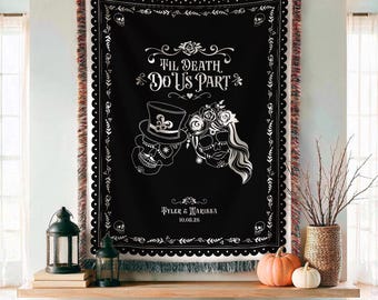 May include: A black woven throw blanket featuring a white graphic of two skulls, one wearing a top hat and the other adorned with roses. The text reads 'TIL DEATH DO US PART' above the names 'TYLER & MARISSA' and the date '10.08.26' in white.