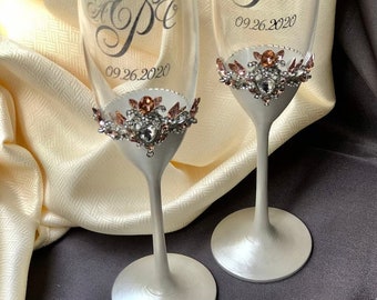 Special order: two champagne flutes cake server and knife with engraving with navy blue crystals