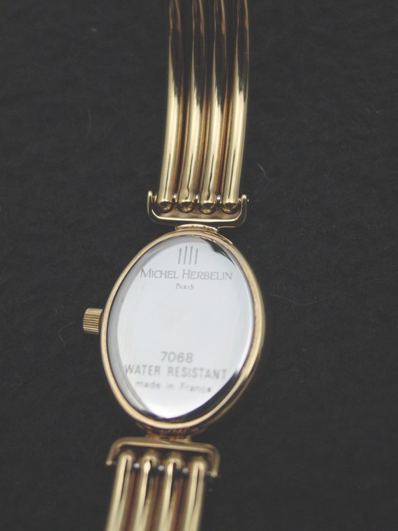 michel herbelin gold bangle watch