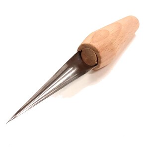 May include: An ice pick with a wooden handle and a stainless steel blade. The handle is light brown, and the blade is sharply pointed. The tool is designed for piercing ice and other materials.