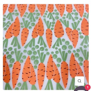 May include: A white background with a repeating pattern of orange carrots and green peas. The carrots are drawn in a simple style with black lines and the peas are green circles.