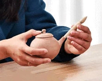 Double Pointed Dowel for Teapot Spout Making (and re rounding holes)