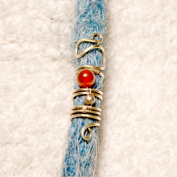 Dread jewelry made of brass with carnelian semi-precious stone bead