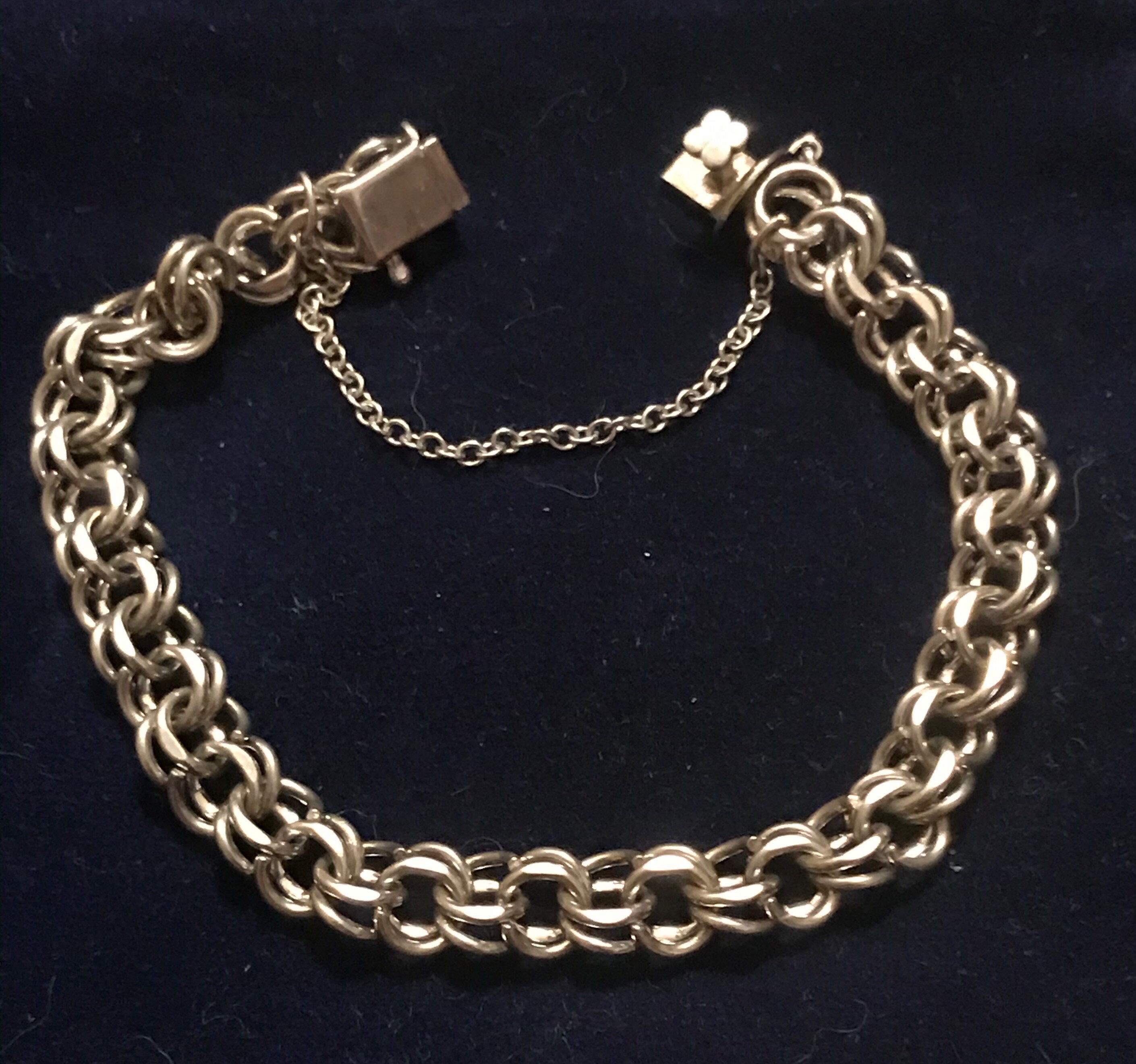 Sterling Silver Chain Bracelet, Doubled Links, Bale designed with a 4 Leaf Clover and smaller Safety Chain. Nice vintage piece, good weight!