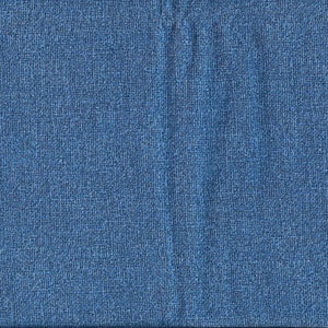 May include: A close-up of a blue fabric with a textured woven pattern. The fabric has a subtle sheen and a slightly rough texture.