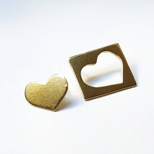 Golden heart brooch