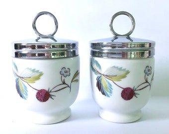 2 Worcester porcelain egg coddlers, 2 standard size coddlers, 2 strawberry and butterfly egg coddlers, pair egg coddlers