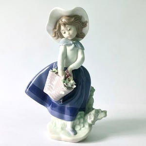 Lladro Pretty Pickings figurine, girl with flower basket statue, Lladro retired girl ornament, 1980s Lladro flower girl ornament