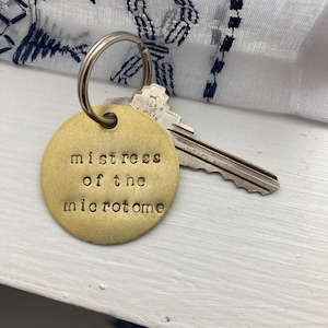 Mistress of the Microtome Hand Stamped Brass Keychain