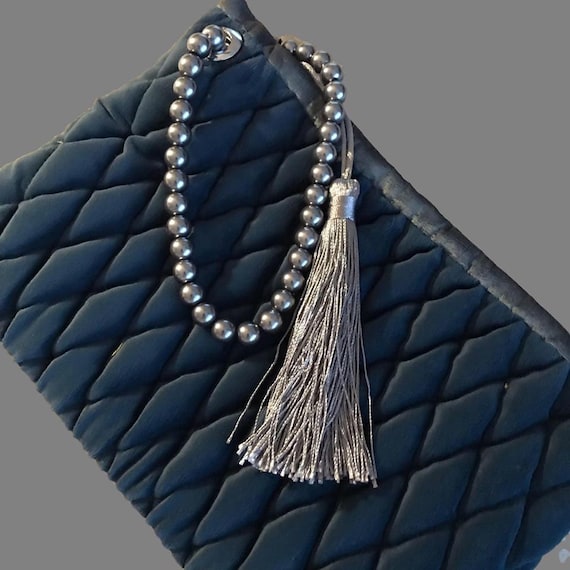 navy blue beaded clutch bag