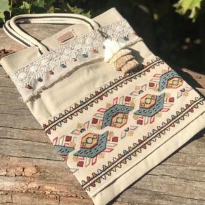 Bag using vintage embroidery and vintage hand-woven linen decor.