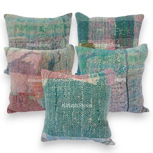 May include: Set of five colorful throw pillows with a patchwork design. The pillows are made from recycled materials and have a unique, vintage look.
