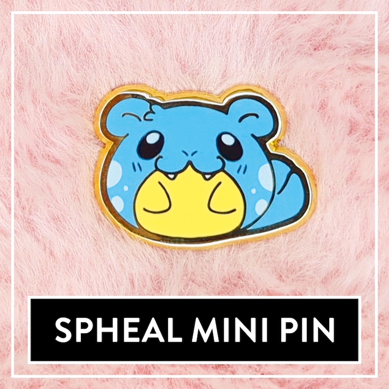 May include: A blue and yellow Spheal mini pin with a gold outline. The pin is on a pink fuzzy background.