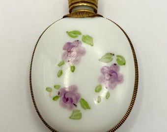 Zabytkowa porcelanowa butelka na perfumy z lat 50. XX wieku