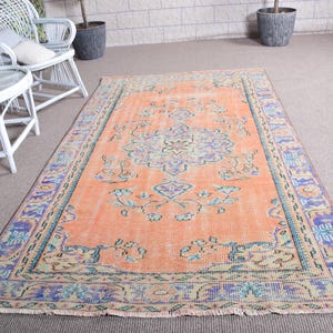 Vintage Turkish Area Rug, Orange and Blue Floral Pattern, 5x8ft, Handwoven Decorative Carpet, Unique Home Decor, Bohemian Style