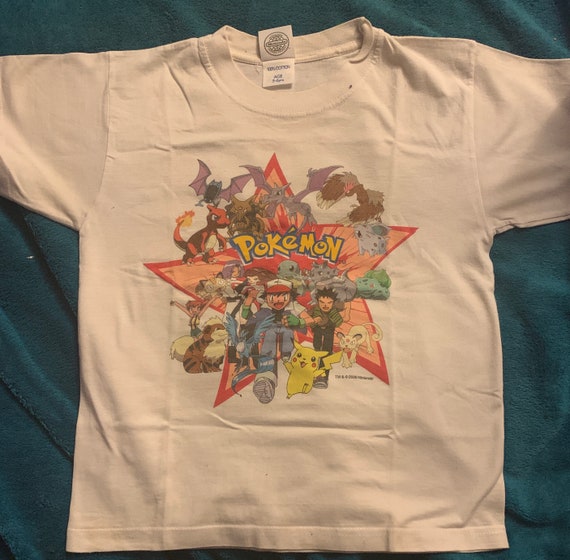 A Vintage Collectable Kids, Pokemon Top by Nintend