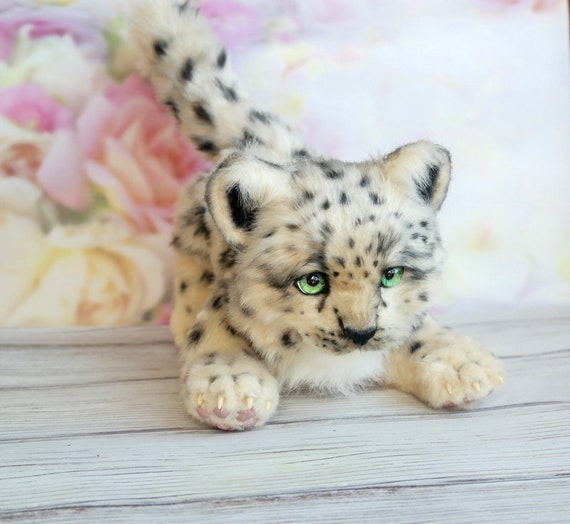 snow leopard plushie