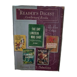 May include: A vintage Reader's Digest Condensed Books collection, "Spring 1955 Selections." The cover is a mix of grey and burgundy, with the title in white and burgundy. Features several book covers, including "The Day Lincoln Was Shot."
