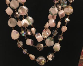 Vendome by Coro Vintage triple strand 16" aurora borealis necklace.