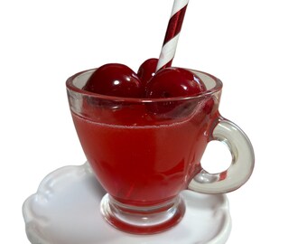 Cup of Cherry Juice with Faux Cherries and a straw