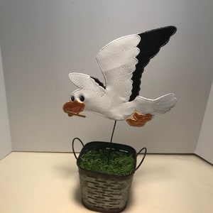 Seagull with French Fry in mouth