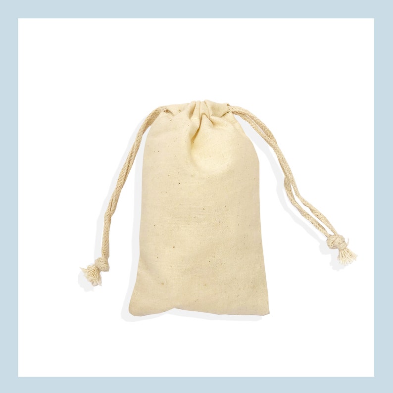 May include: A plain white cotton drawstring bag with a natural cotton cord.