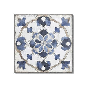 May include: A square tile with a blue and white geometric pattern. The tile has a distressed, vintage look.
