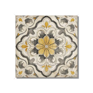 May include: Square decorative tile with a floral pattern. The design features a central yellow flower surrounded by gray and yellow accents on a cream background. The tile has a vintage, watercolor style.