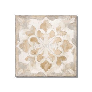 May include: A square ceramic tile with a beige and white floral pattern. The tile has a distressed, vintage look.