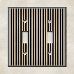 May include: A black and beige striped light switch cover plate. The plate has two toggle switches.