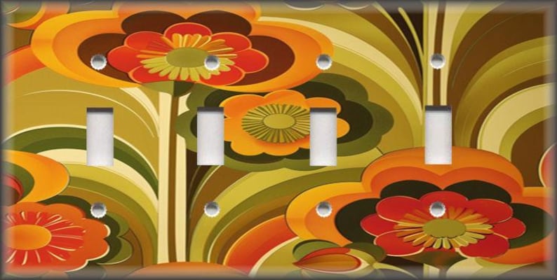 May include: A decorative triple light switch cover with a retro floral design. The cover features a vibrant pattern of orange, red, green, and brown flowers and swirling shapes. The light switches are white.