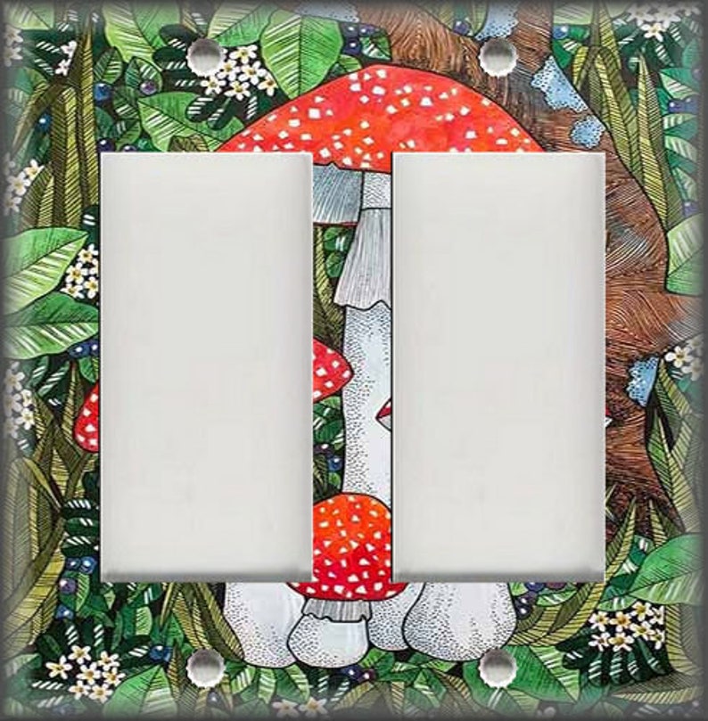 May include: A double light switch cover featuring a whimsical illustration of red and white mushrooms in a green forest setting.