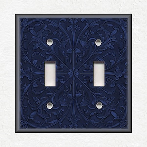May include: A dark blue light switch cover with a decorative embossed floral pattern.