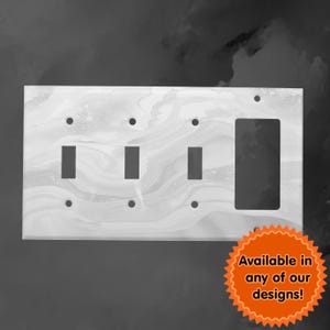 May include: White light switch plate with a marble pattern and three toggle switches and one outlet. Available in any of our designs!