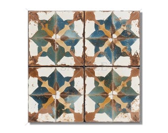 May include: Four square ceramic tiles with a distressed, vintage look. Each tile features a blue, green, and yellow starburst pattern on a white background.