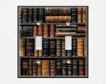 May include: A light switch cover featuring a bookshelf filled with vintage, leather-bound books. The books are arranged in rows on wooden shelves. The switch cover is a standard size and can be used to replace an existing switch cover.
