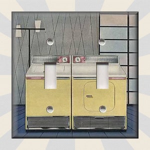 May include: A vintage-style illustration of two yellow washing machines with silver trim and black knobs. The machines are set against a backdrop of a tiled wall and a window with a patterned curtain.