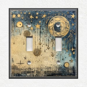 May include: A light switch cover with a vintage design featuring a moon, stars, and a background of old text and gold accents.