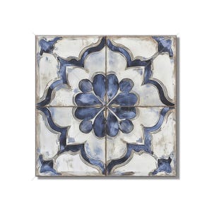May include: A square ceramic tile with a blue and white floral design. The tile has a distressed, vintage look.