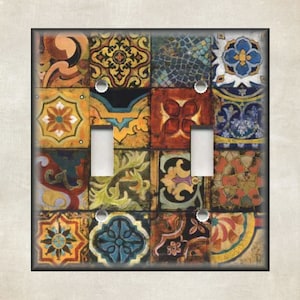 May include: A light switch cover with a colorful mosaic tile design. The tiles are in shades of blue, green, yellow, orange, and red. The switch cover is made of durable plastic and is easy to install.