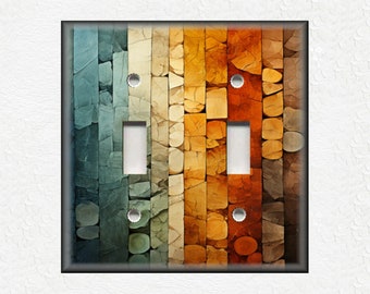 Peut inclure: Une plaque de prise de courant avec un motif abstrait coloré présentant une mosaïque de formes rectangulaires dans des tons de bleu, vert, jaune, orange et marron.