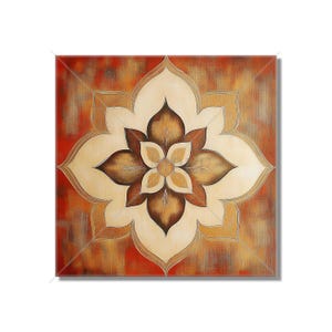 May include: A square canvas painting with a large, stylized flower in the center. The flower is a light beige color with brown petals and a yellow center. The background is a reddish-brown color with a mottled texture.