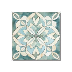 May include: A square tile with a blue and white geometric pattern. The pattern is made up of overlapping circles and leaves, creating a symmetrical design.