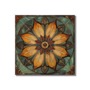 May include: A square canvas print with a colorful mandala design. The mandala features a central flower with eight petals in shades of orange, yellow, and brown. The background is a teal blue with hints of green and brown.