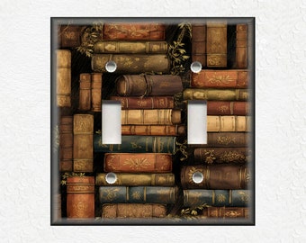 May include: A light switch cover with a vintage design featuring a stack of old books with brown, gold, and green spines.