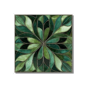 May include: Square decorative tile featuring a symmetrical floral design. The design is composed of leaf-like shapes in varying shades of green, outlined with dark lines. The overall effect is reminiscent of stained glass.