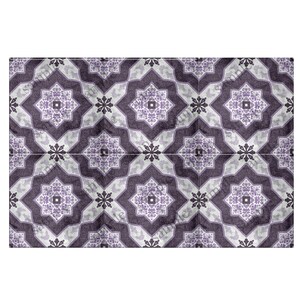 May include: Purple and white patterned tile with a geometric design. The tile has a distressed look, giving it a vintage feel.