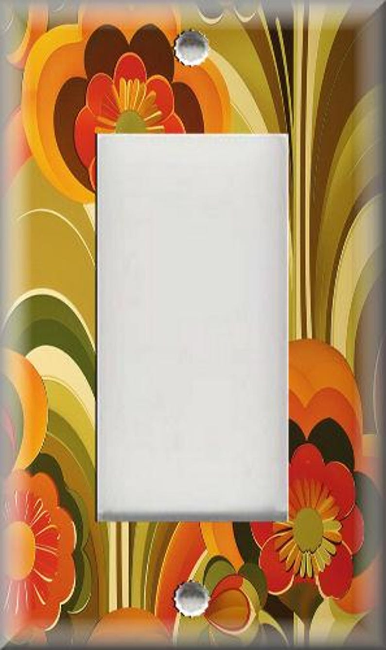 May include: A decorative light switch cover with a retro floral design. The cover features a white center panel surrounded by a vibrant pattern of orange, red, yellow, and green stylized flowers and curved lines. The design evokes a vintage aesthetic.