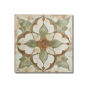 May include: Square wall art featuring a symmetrical floral design. The artwork showcases a central brown flower surrounded by white, green, and brown petal-like shapes. The background has a textured, off-white and brown appearance.